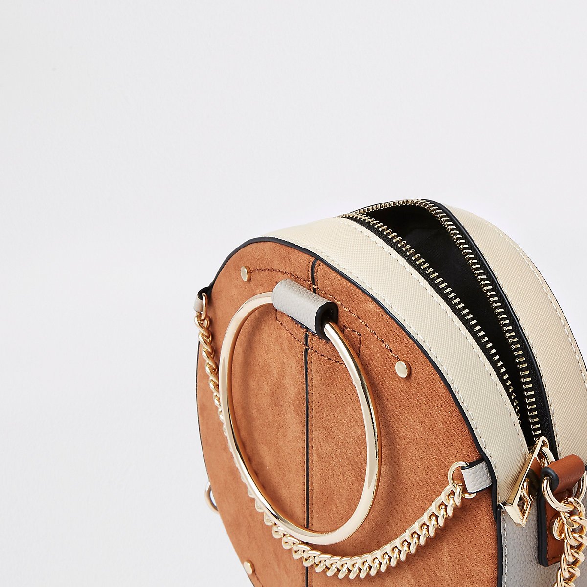 Beige ring handle circle cross body bag