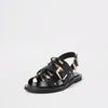 Black faux leather chain trim sandals