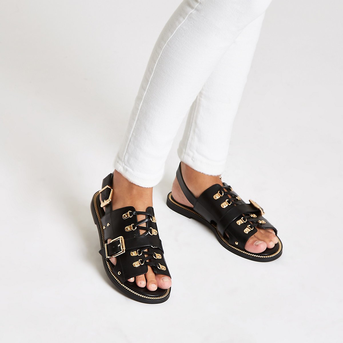 Black faux leather chain trim sandals