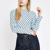 Navy polka dot print high neck top